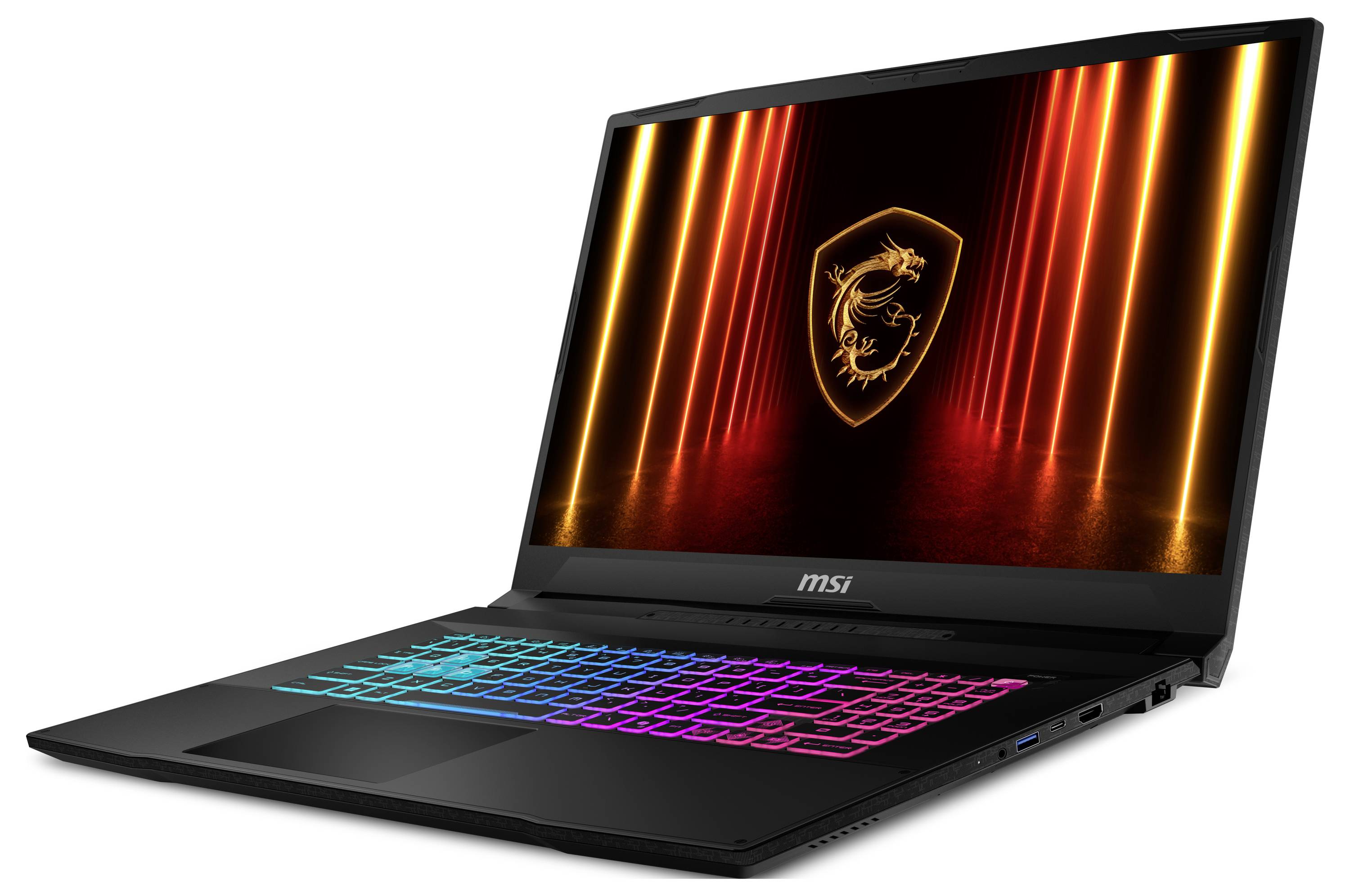 Otvorený herný notebook MSI s podsvietanou RGB klávesnicou a logom draka na obrazovke, zobrazený na bielom pozadí.