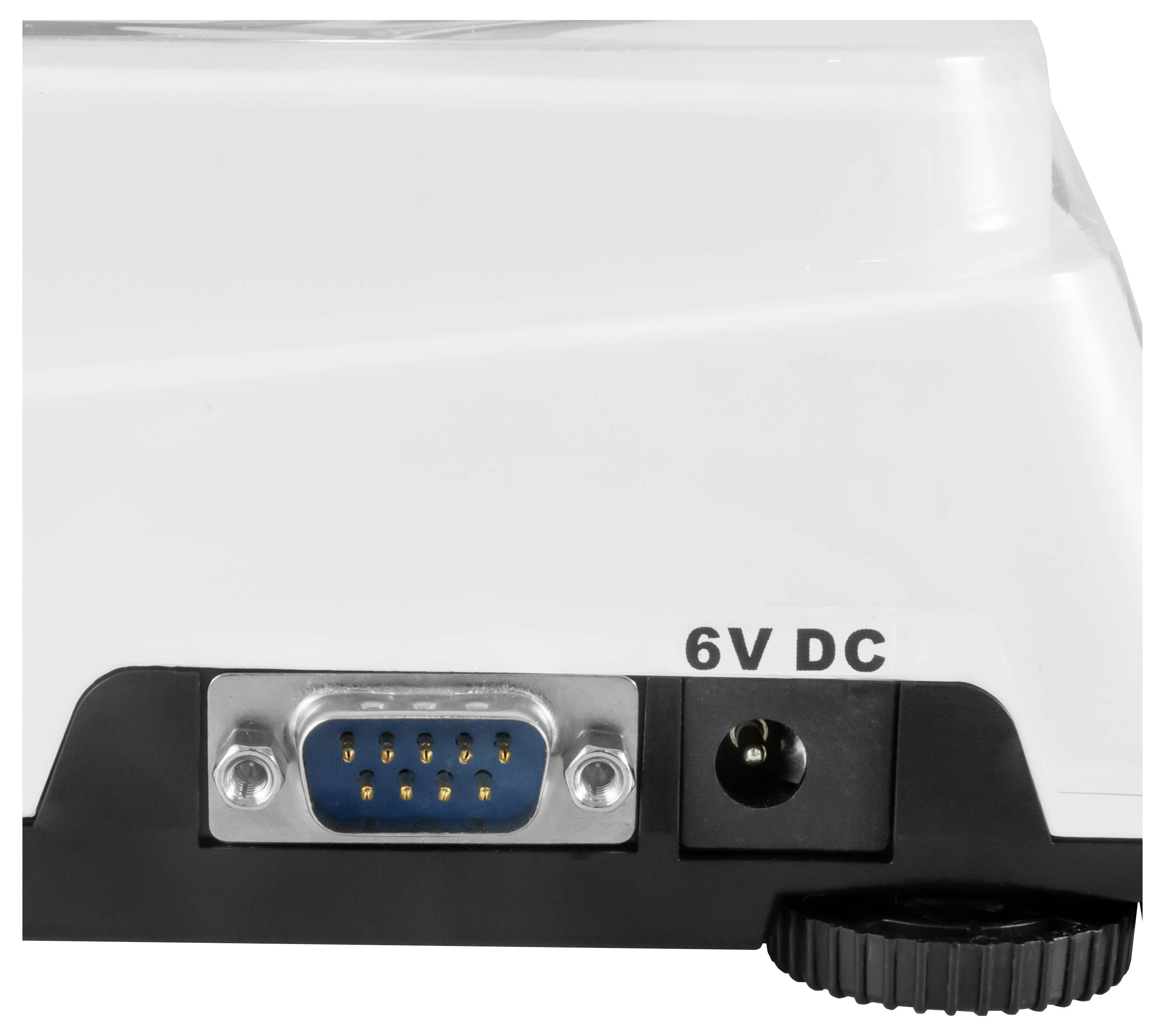 Detailný záber na zadný panel zariadenia s 9-kolíkovým sériovým portom a konektorom napájania označeným „6V DC".