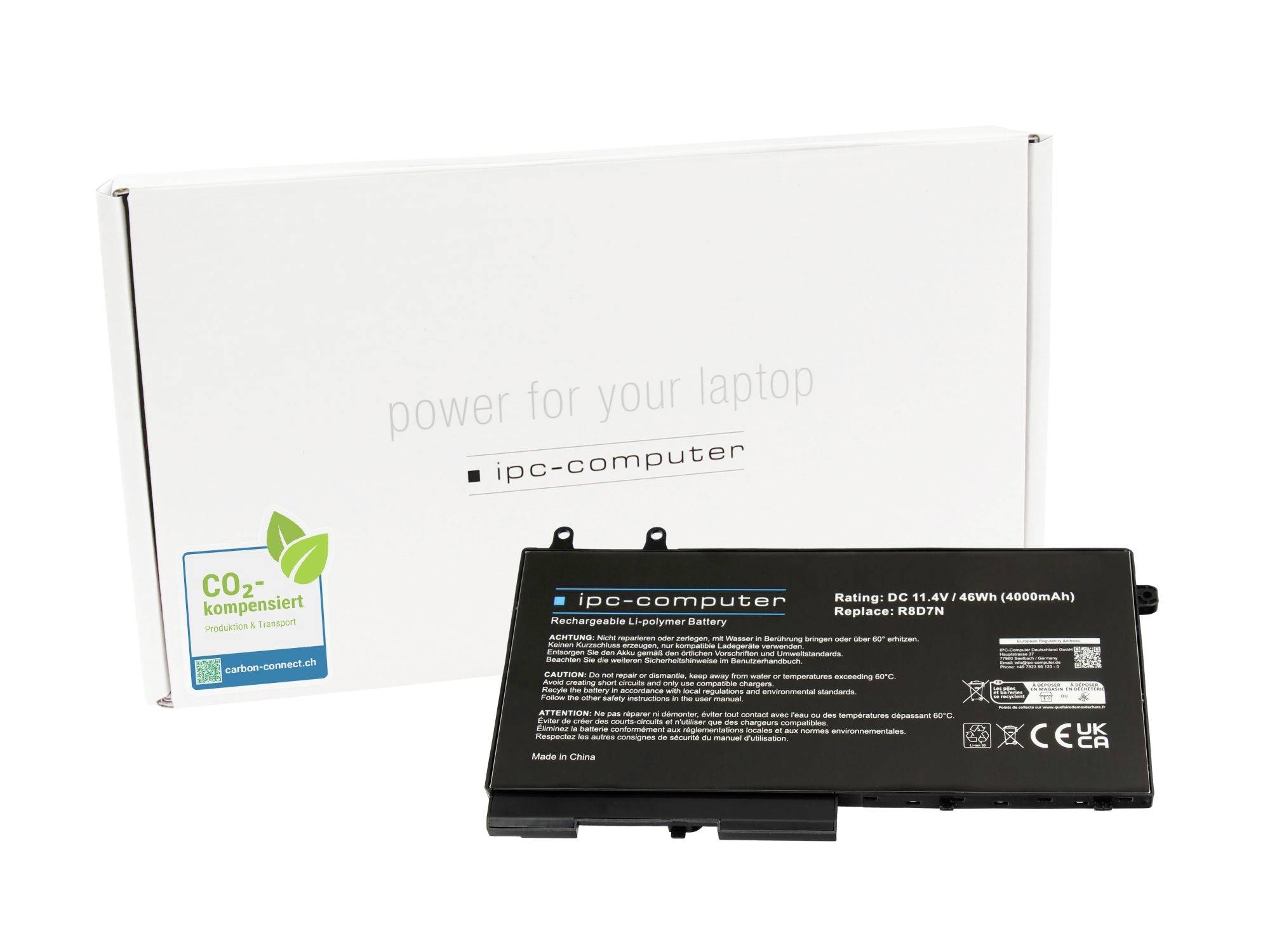 Čierna batéria notebooku na náhradu pred bielym balením s označením "power for your laptop" a "ipc-computer", s logom CO2-kompensiert.