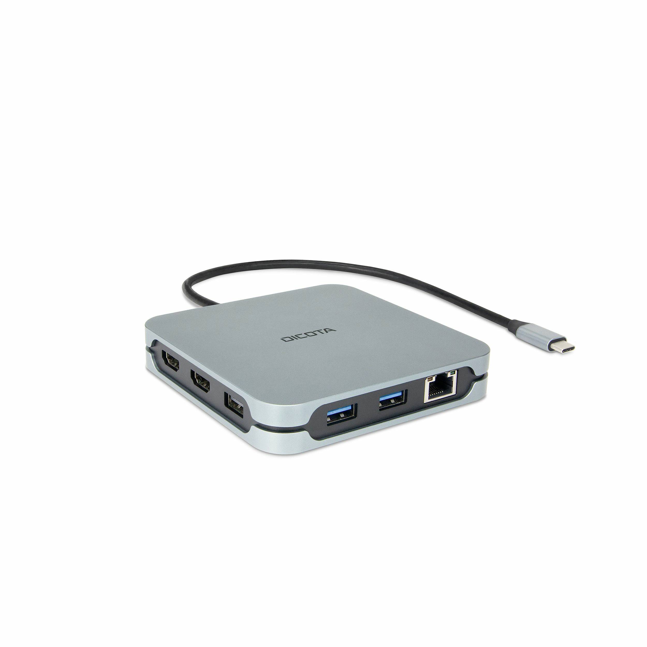 Kompaktný USB-C hub s pripojeným kablom, ktorý zobrazuje viacero portov vrátane HDMI, USB-A a Ethernetu.