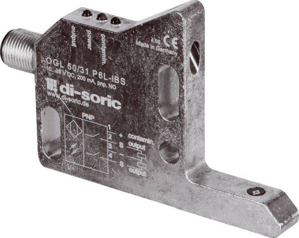 Priemyselný difúzny fotoelektrický senzor v kovovom upevňovacom držiaku, označený "OGL 50/31 P6L-IBS" s výstupom PNP a indikátormi stavu.