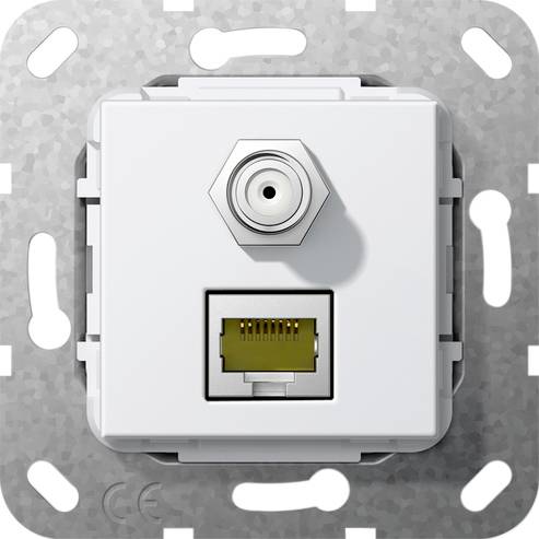 Nástenná biela sieťová zásuvka s koaxiálnym a ethernetovými portami na sivej podkladovej doske.