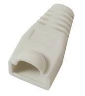 Zblízka malý krém plastový kryt alebo čepička konektora so vrúbkovaným vrchom a otvoreným koncom.