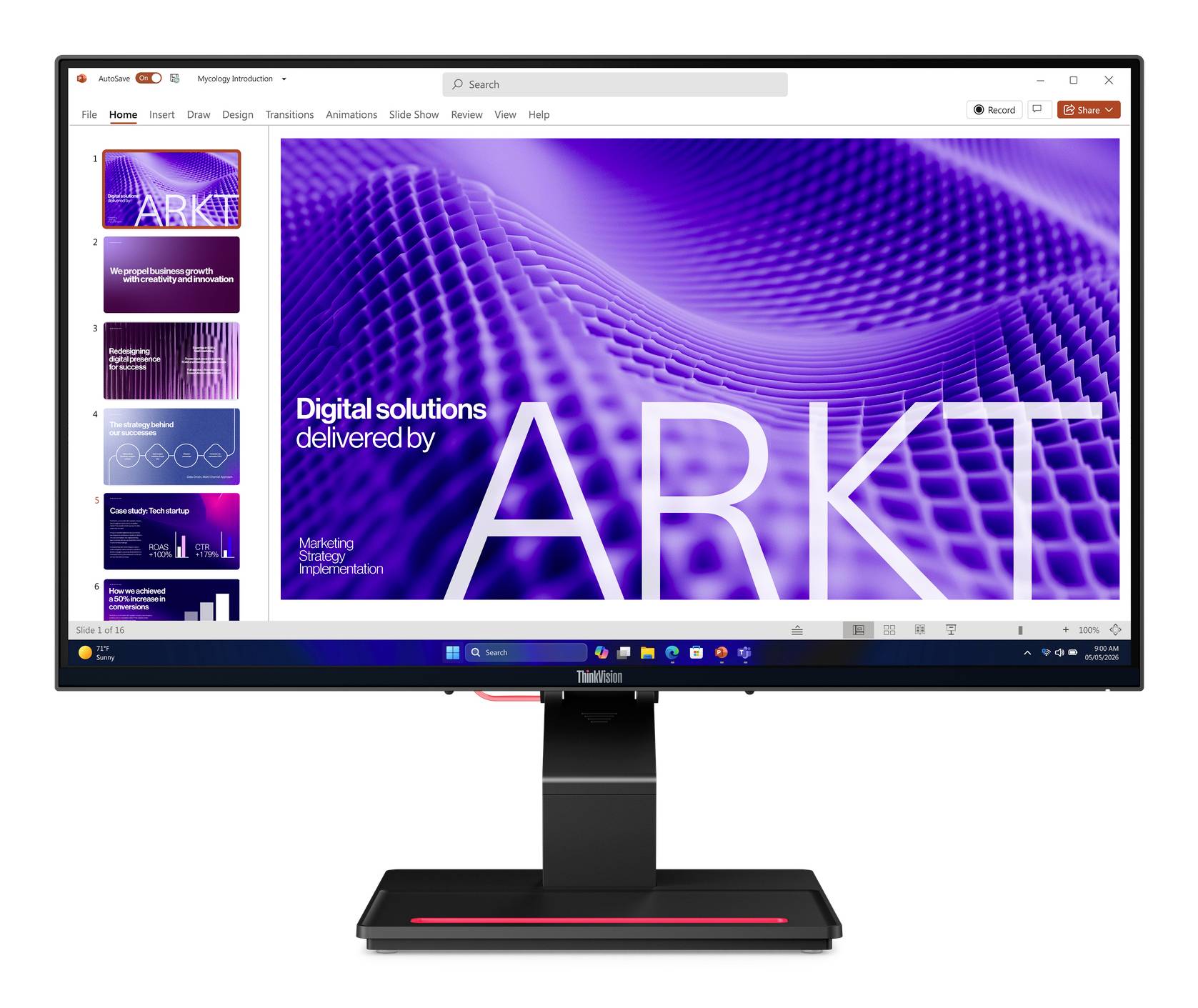 Stolný monitor zobrazuje PowerPointovú prezentáciu s názvom "ARKT" s fialovým vlnitým pozadím a snímkami v ľavom pane miniatúr.