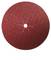 Červený brúsny kotúč s centrálnym otvorom a jemnozrnnou štruktúrou.