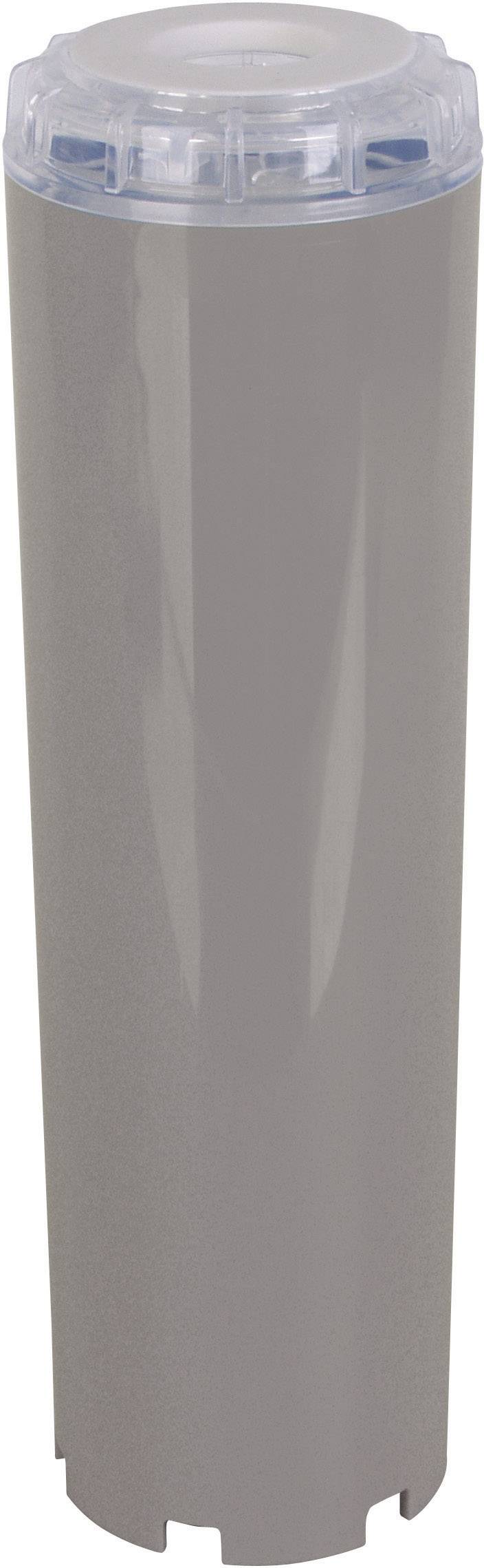 Sivý cyklický predmet s priehľadným krytom, pravdepodobne filter alebo kartridž, na bielom pozadí.