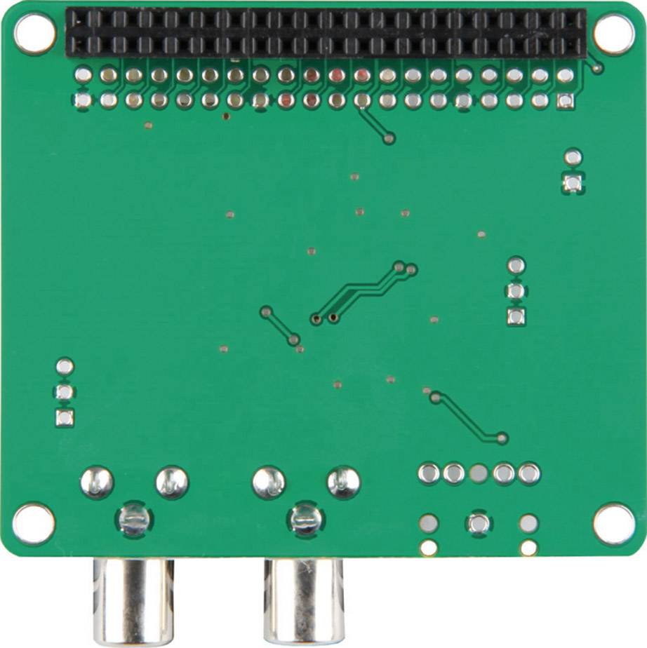 Zelená elektronická doska s rôznymi spájkovacími miestami a súčiastkami. Dva kovové konektory na spodnej strane.