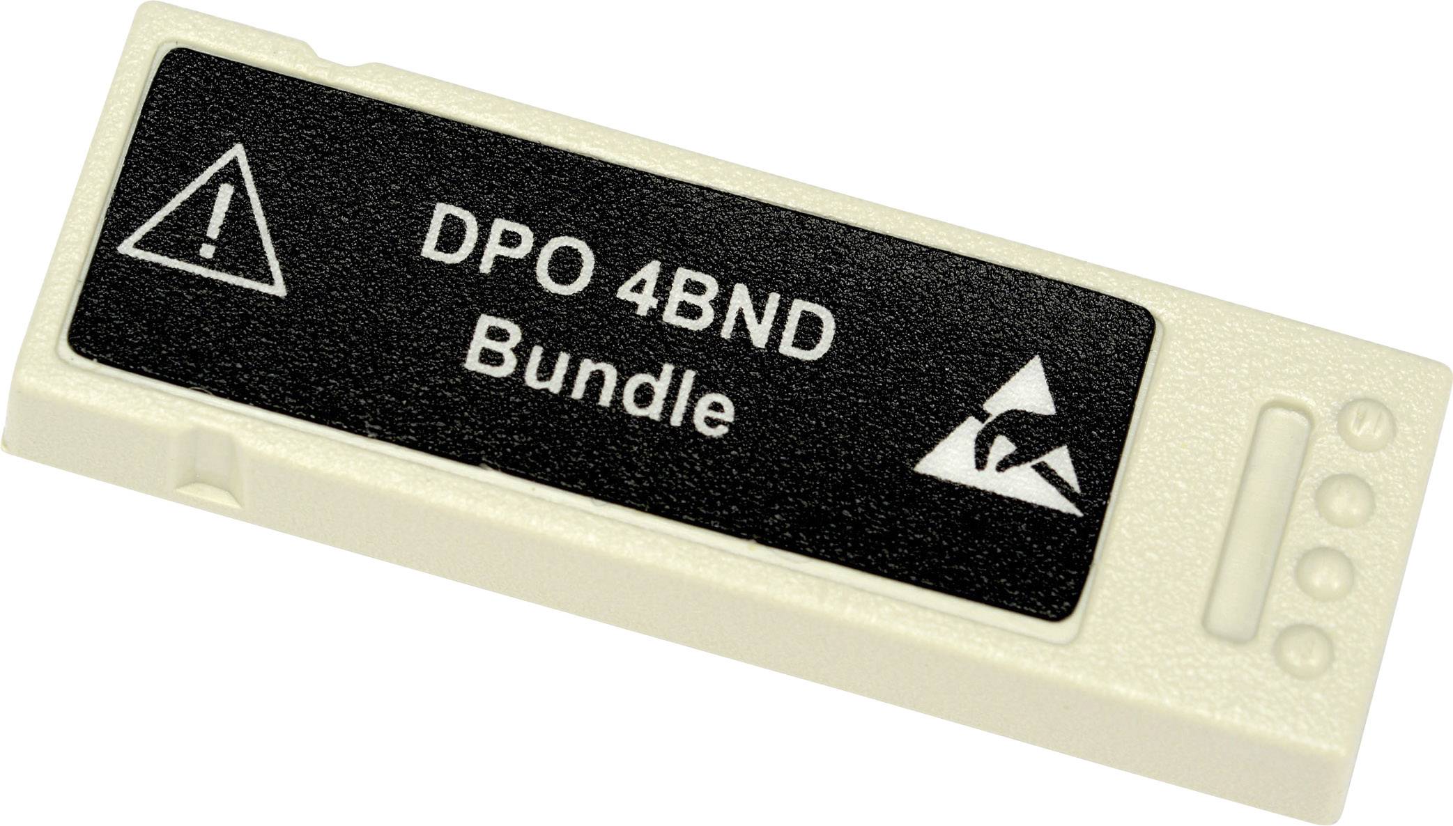 Obdĺžnikové zariadenie s nápisom 'DPO 4BND Bundle' a výstražným symbolom.