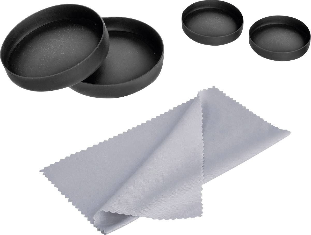 Čierne okrúhle dózy, čiastočne otvorené, a sivá mikrovláknová utierka.