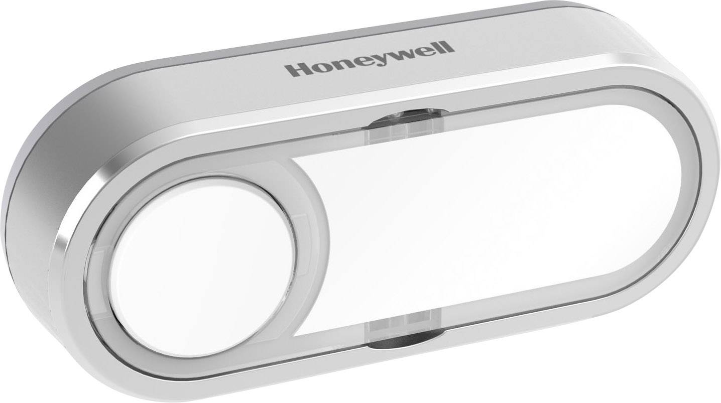 Podlhovastý, strieborný prístroj s kruhovým tlačidlom vľavo, na ktorom je názov značky 'Honeywell'.