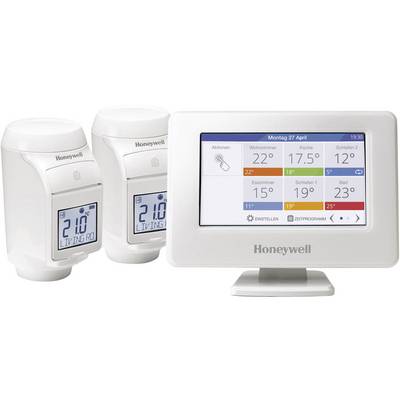 Termostatické ovládanie od Honeywell s dvoma termostatickými hlavicami a nástennným displejom. Displej zobrazuje teploty v rôznych miestnostiach.