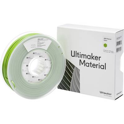Cievka so zeleným ABS 3D tlačovým materiálom vedľa balenia s nápisom "Ultimaker Material".