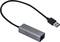 USB-Ethernet adaptér so sivým krytom a čiernym káblom, vhodný pre sieťové pripojenia.