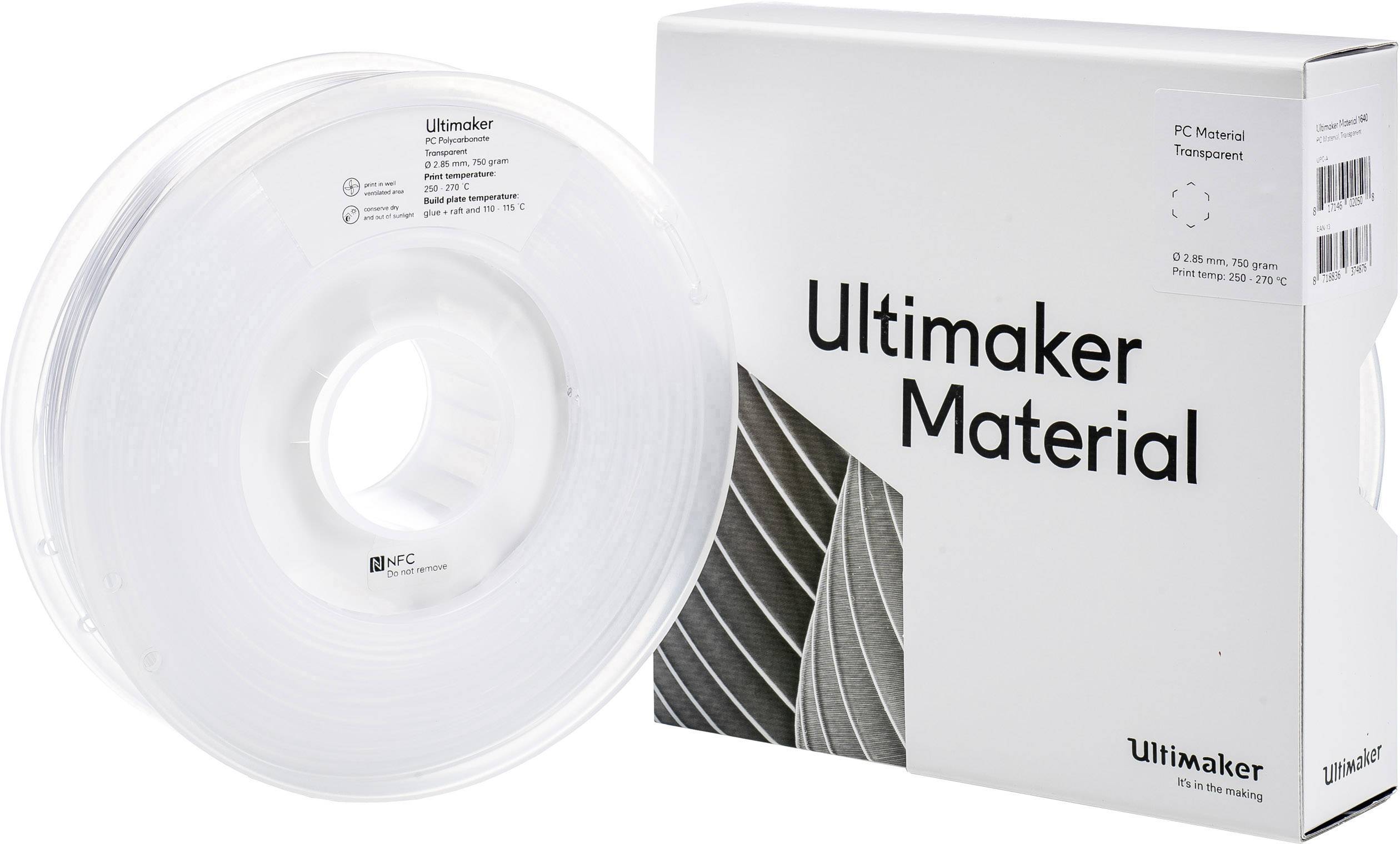 Cievka s priehľadným 3D tlačovým filamentom od Ultimakeru vedľa obalu s nápisom "Ultimaker Material".