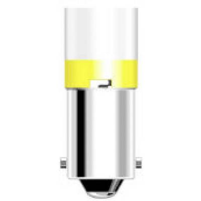 Žltá a strieborná stojanová lampa, ktorá stojí vzpriamene.