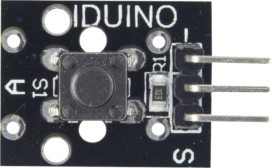 Čierna doska s tlačidlom v strede, obklopená konektormi a nápisom 'A DUIDUINO'. Trojpólové zástrčkové lišty vpravo.