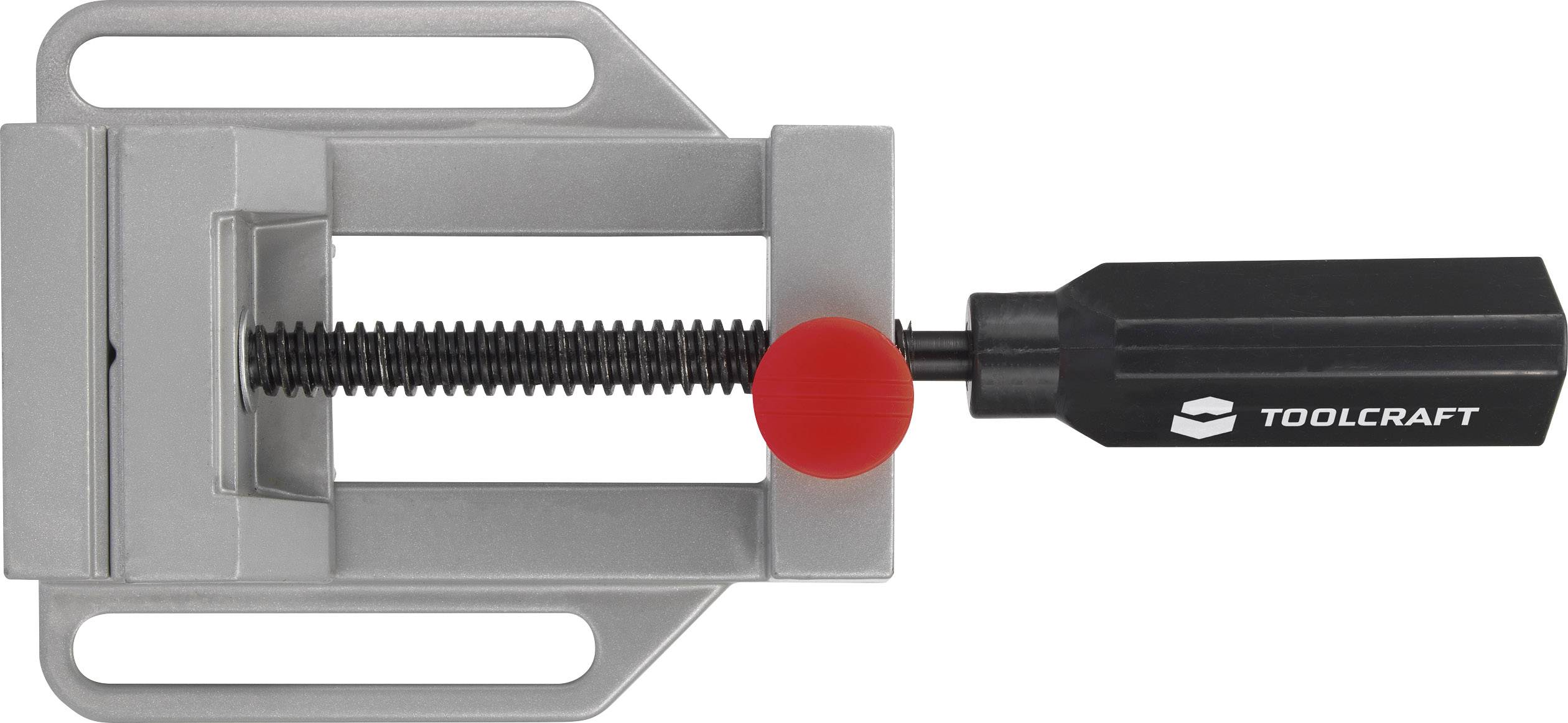 Svorka s červenou rukoväťou a logom 'Toolcraft', použiteľná na upevnenie obrobkov počas ich opracovania.