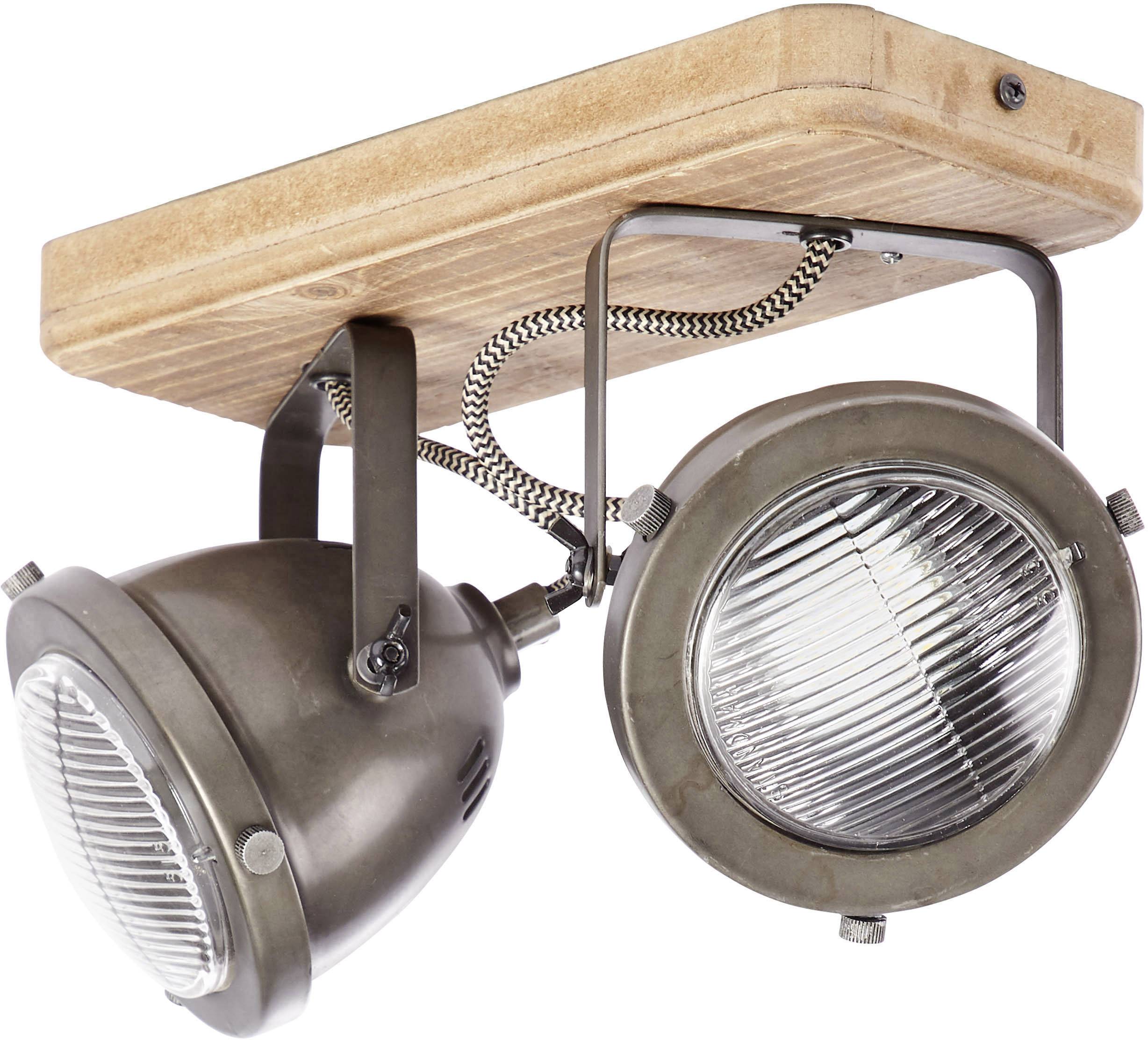 Dva strieborné stropné reflektory z kovu, namontované na obdĺžnikovom drevenom držiaku, smerujú nadol.