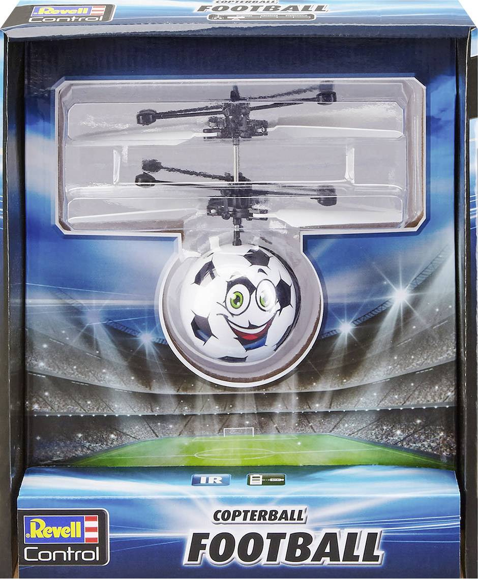 Obal hračky 'Copterball Football' od firmy Revell, vznášajúca sa futbalová lopta s rotormi, prezentovaná v pozadí štadióna.