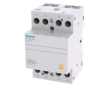 Sivý Siemens impulzný spínač s viacerými svorkami a žltým tlačidlom, používaný pre elektrické spínacie zariadenia.