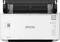 Skener Epson DS-410 spredu, otvorený. Skenuje dokumenty; vhodný pre kancelárie s vysokou mierou skenovania. Viditeľné jasné ovládacie prvky.