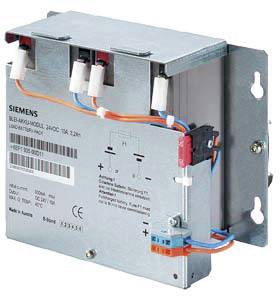 Elektrický modul Siemens s viacerými káblovými pripojeniami, ktorý sa používa v priemyselnom alebo technickom prostredí.