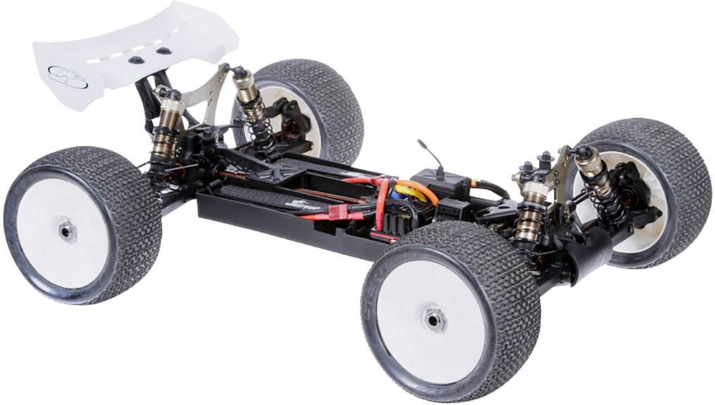 Diaľkovo ovládaný automobilový podvozok so štyrmi veľkými offroad pneumatikami. Zavesenie a pruženie sú viditeľné, so systémom elektroniky v strede.