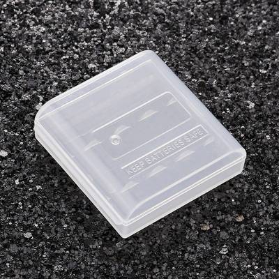 Priehľadný plastový obal na dve AA batérie, označený nápisom 'Keep Batteries Safe' na čiernom pozadí.