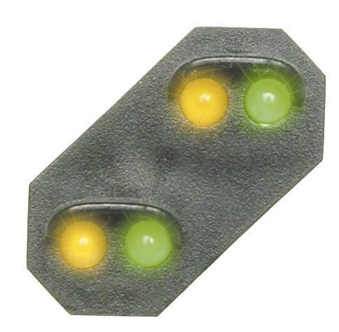 Dve okrúhle LED lampy, jedna žltá a jedna zelená, svietia na obdĺžnikovom povrchu.