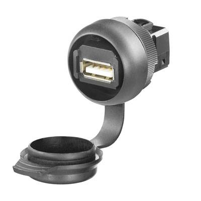 Guľatá USB zásuvka s ochranným krytom v čiernej farbe, vhodná na zabudovanie do zariadení na prepojenie s USB konektormi.