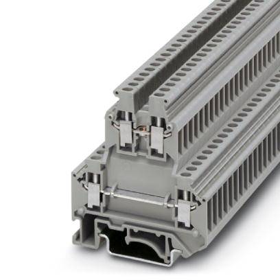 Sivý elektrický svorkovnicový blok s viacerými pripojovacími miestami, používaný na zapojenie v rozvádzačoch a elektroinštaláciách.