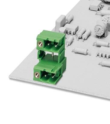 Zelené konektory na doske plošných spojov, obklopené elektronickými súčiastkami ako sú kondenzátory a rezistory.