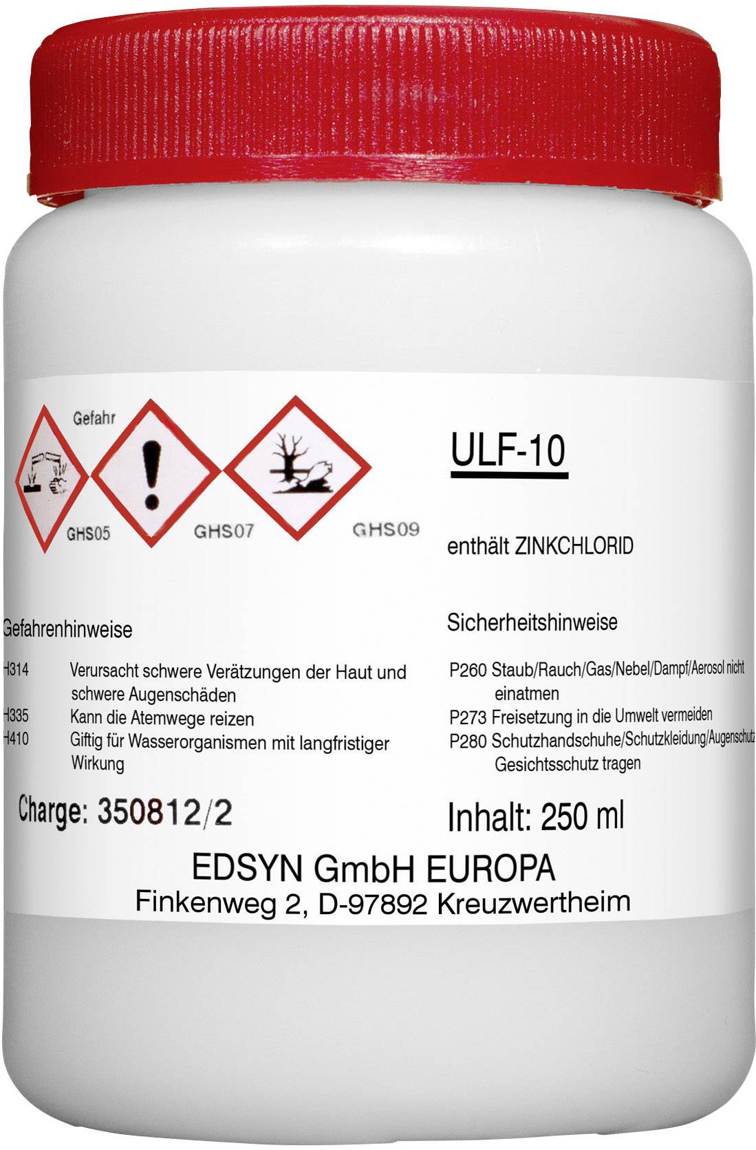 Biely kontajner s červeným vekom. Etiketa zobrazuje 'ULF-10' a výstražné upozornenia: dráždivý, nebezpečný pre životné prostredie. Obsahuje chlorid zinočnatý.