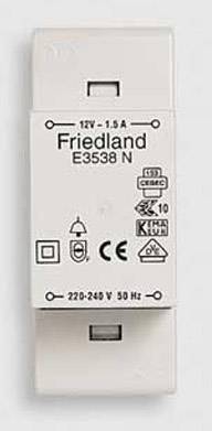 Biely zvonový transformátor s potlačou 'Friedland E3538 N', technickými špecifikáciami a rôznymi bezpečnostnými certifikáciami.