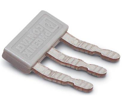 Sivý elektronický konektor s tromi zubaným kovovým kontaktom, ležiaci na povrchu.