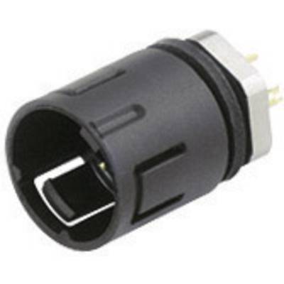 Čierny valcový konektor s kovovými kontaktmi vzadu. Vhodný na pripojenie v elektronických zariadeniach alebo káblových systémoch.