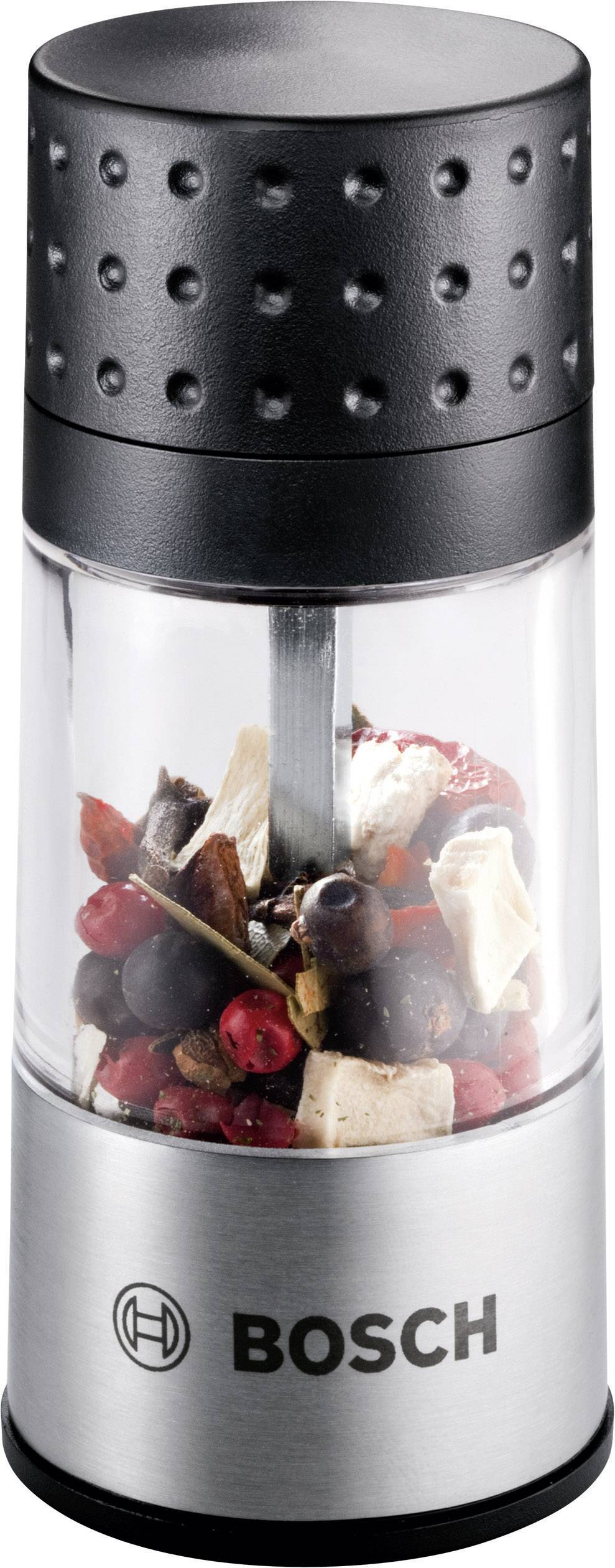 Mlynček na korenie od Bosch s priehľadným krytom, naplnený zmiešanými černými a farebnými koreninami.