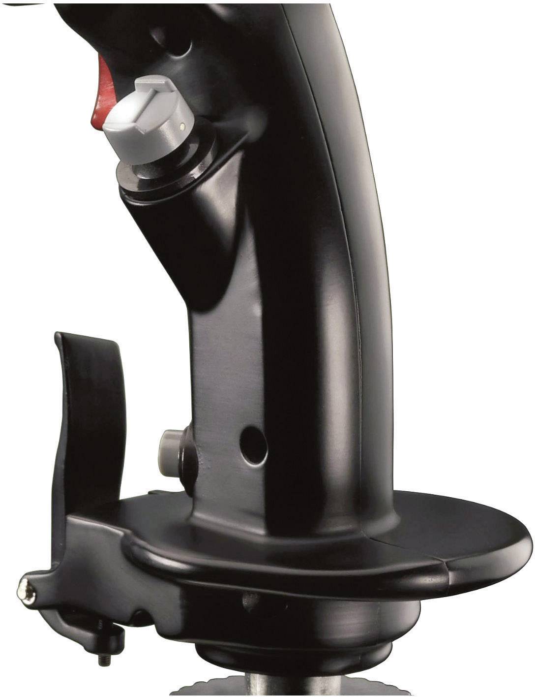 Čierna, ergonomicky tvarovaná rukoväť s pákou a otočným gombíkom. Patrí k nejakému nástroju, pravdepodobne motorovej píle.