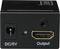 Čierny adaptér s tromi konektormi: DC/5V pre napájanie, LED indikátor a HDMI výstup označený ako 'Output'.