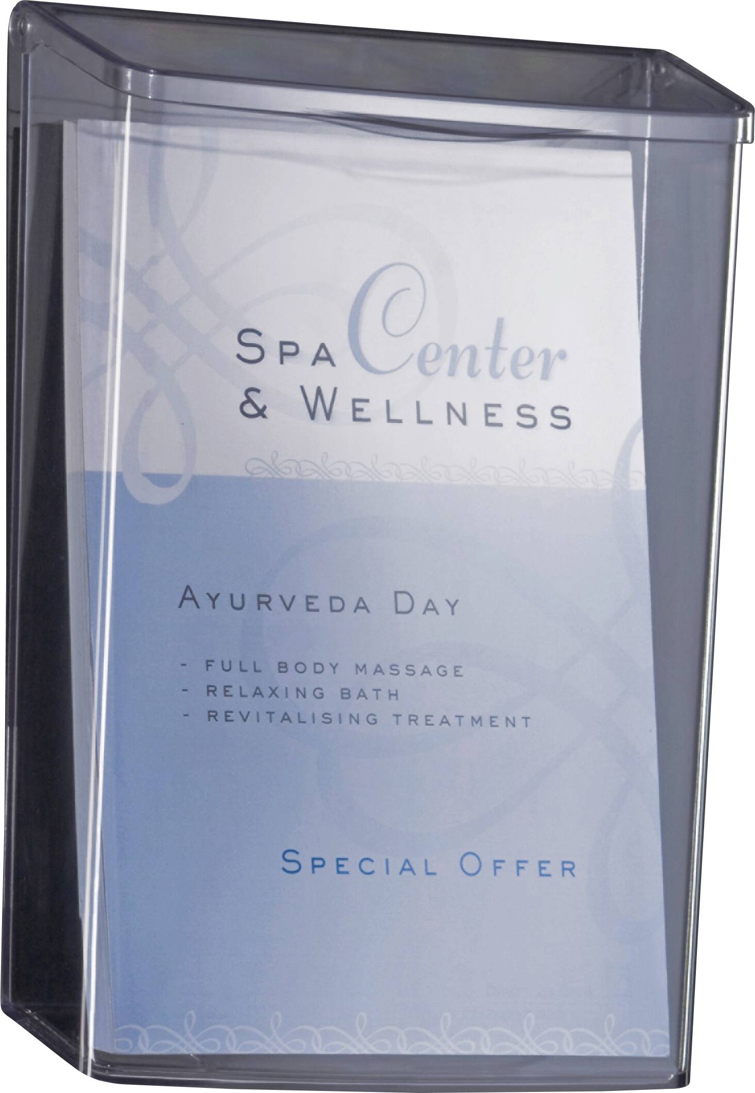 Modra namizna reklamna tabla za Spa Center & Wellness, ki reklamira posebno ponudbo Ayurveda Day: celostna masaža telesa, sproščujoče kopanje in revitalizacijski tretma.