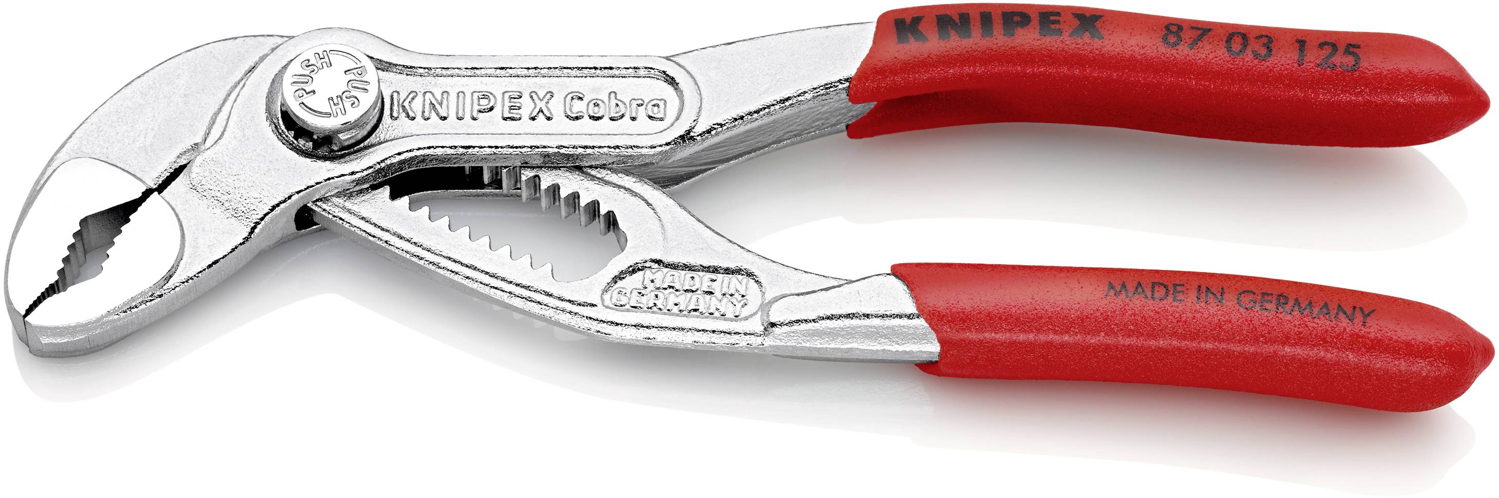 Klešče znamke KNIPEX z rdečim ročajem in srebrnim, nazobčanim parom čeljusti. Napis na ročaju: 'MADE IN GERMANY'.