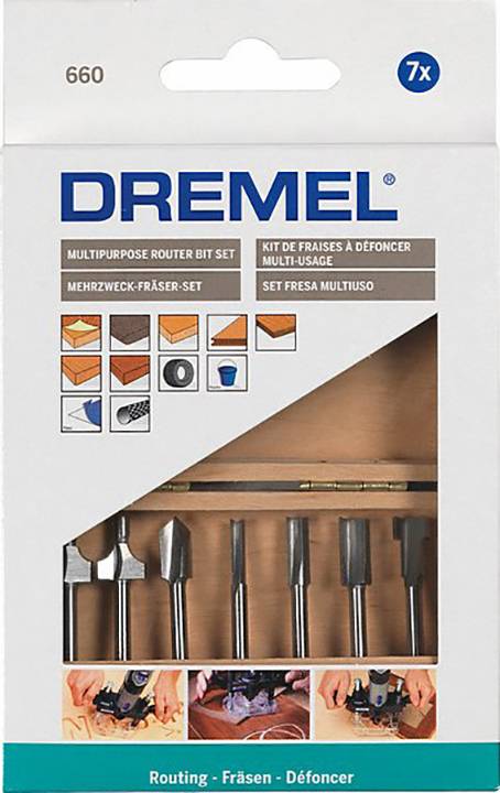 Embalaža z Dremel večnamenskim kompletom rezkarjev. Vsebuje sedem rezkarjev, prikazanih na produktnih fotografijah. Vključuje navodila za rezkanje in uporabo.