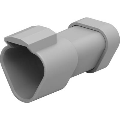Siv plastični predmet z pravokotno odprtino in porezanimi robovi, verjetno adapter ali priključni konektor.