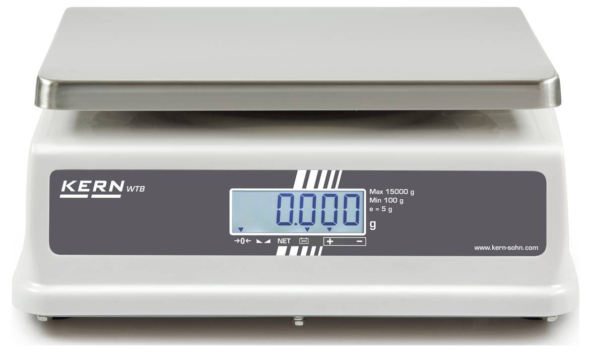 Digitalna kuhinjska tehtnica z LCD zaslonom in štirimi tipkami na sivi podlagi. Maksimalna kapaciteta 15 kg, minimalna obremenitev 10 g.
