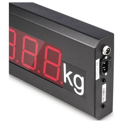 Elektronska prikazovalka z rdečo LED-zaslonom prikazuje meritve v kilogramih. Stranski pogled z vidnimi priključnimi vtičnicami.