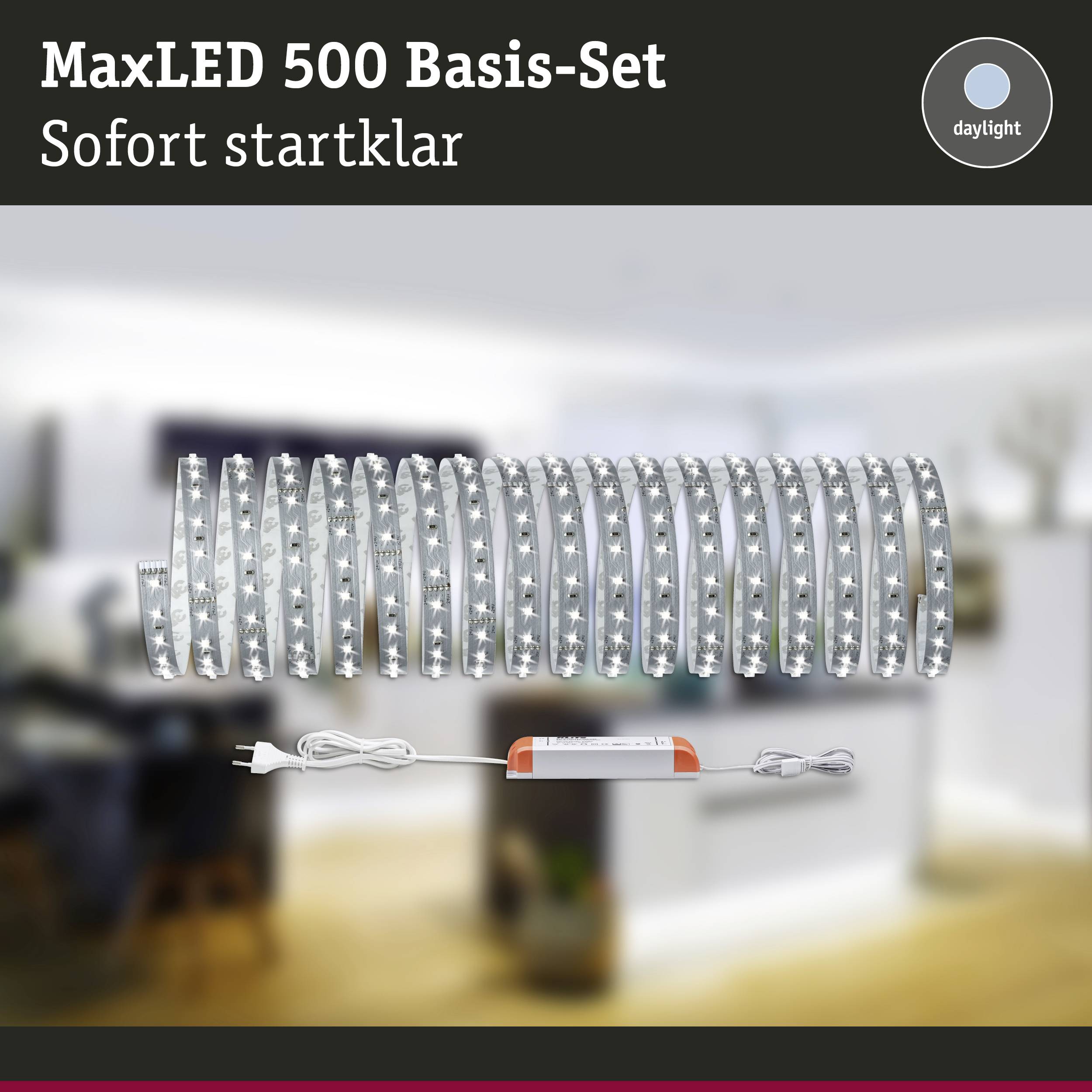 Slika prikazuje MaxLED 500 osnovno set z vijačasto LED-trakovo in napajalnikom. Besedilo: 'Takoj pripravljen za zagon'.