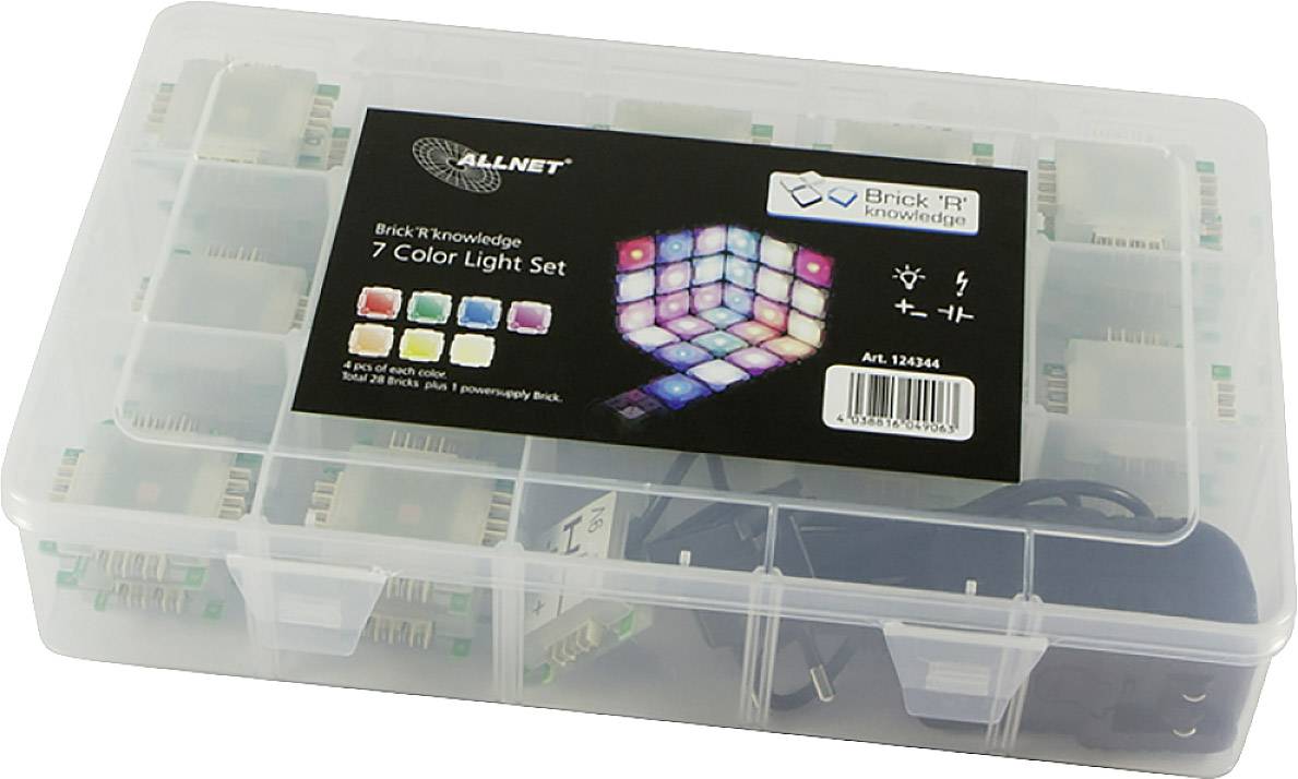 Plastična škatla z 'Brick 'R' knowledge 7 Color Light Set', vsebuje barvne plastične gradbene elemente in kable, pripravljena za predstavitev.