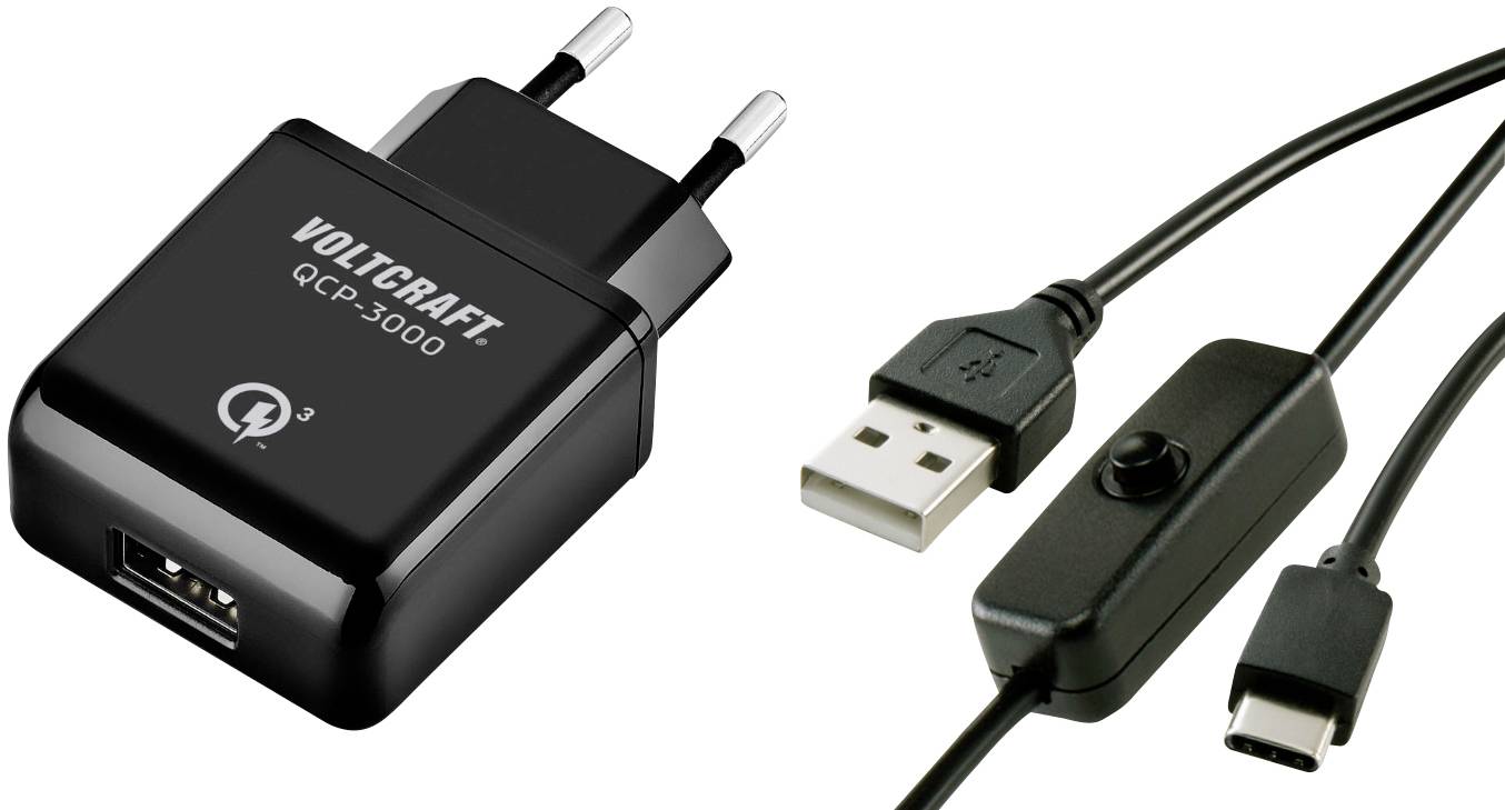Črn USB polnilec s tehnologijo hitrega polnjenja, poleg katerega leži USB kabel z vgrajenim stikalom za vklop/izklop in USB-C priključkom.