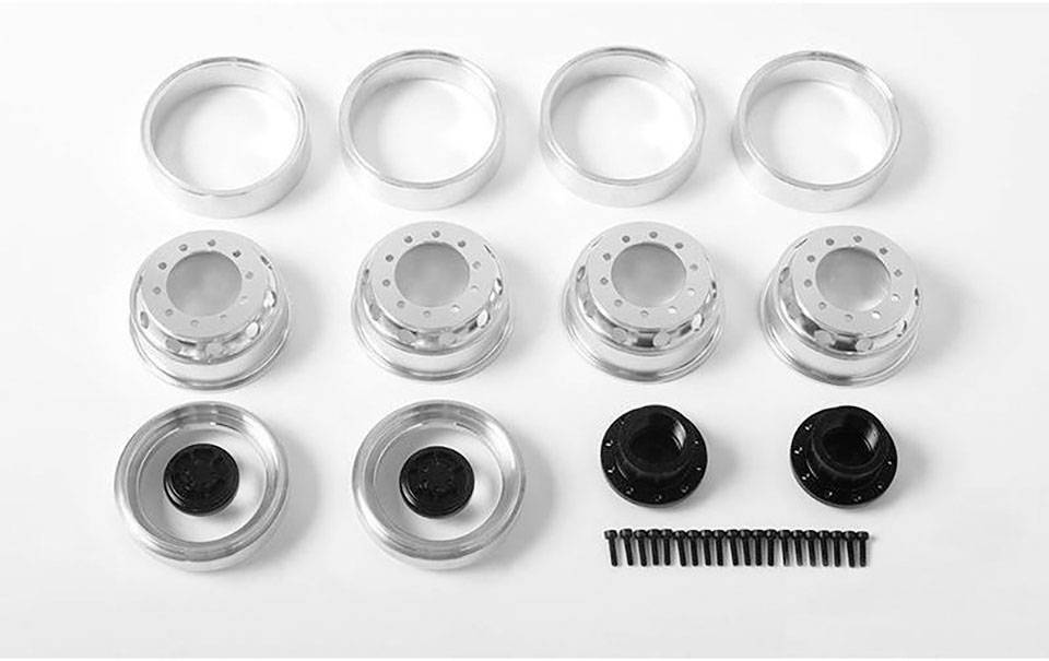 Kovinska kolesa v posameznih delih, pripravljena za sestavo. Zgornja vrsta: obroči, srednja vrsta: platišča, spodnja vrsta: pesti in vijaki.