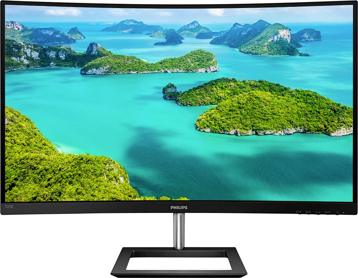 Ukrivljen Philipsov monitor prikazuje tropsko otočje z modrim morjem in gosto poraščenimi otoki pod jasnim nebom.